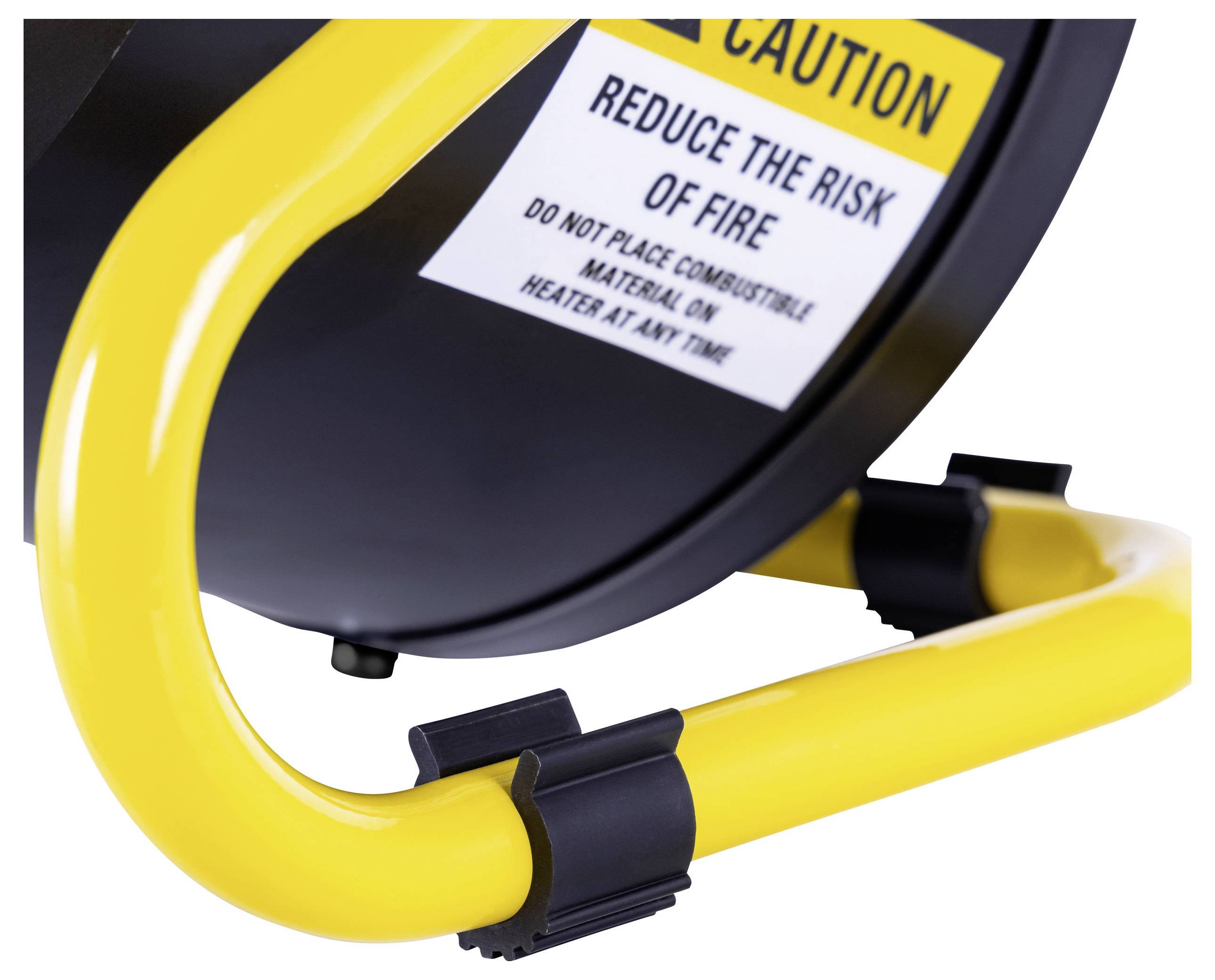 A yellow stand holding a circular object with a caution label. The label warns against placing combustible materials on the heater.