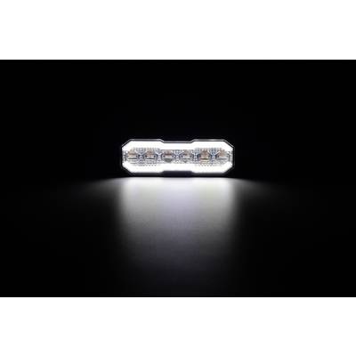 A rectangular LED light bar illuminated in the dark, casting a bright, focused beam on the surface beneath it.
