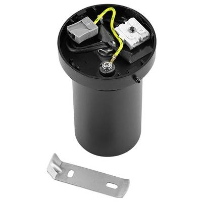 A cylindrical black device with visible internal components, cables, and connectors on top. A small metal part lies beside it.