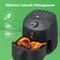 Black air fryer with chicken legs. Text: 'Efficient, Quick, Space-Saving'. Energy saving symbols.