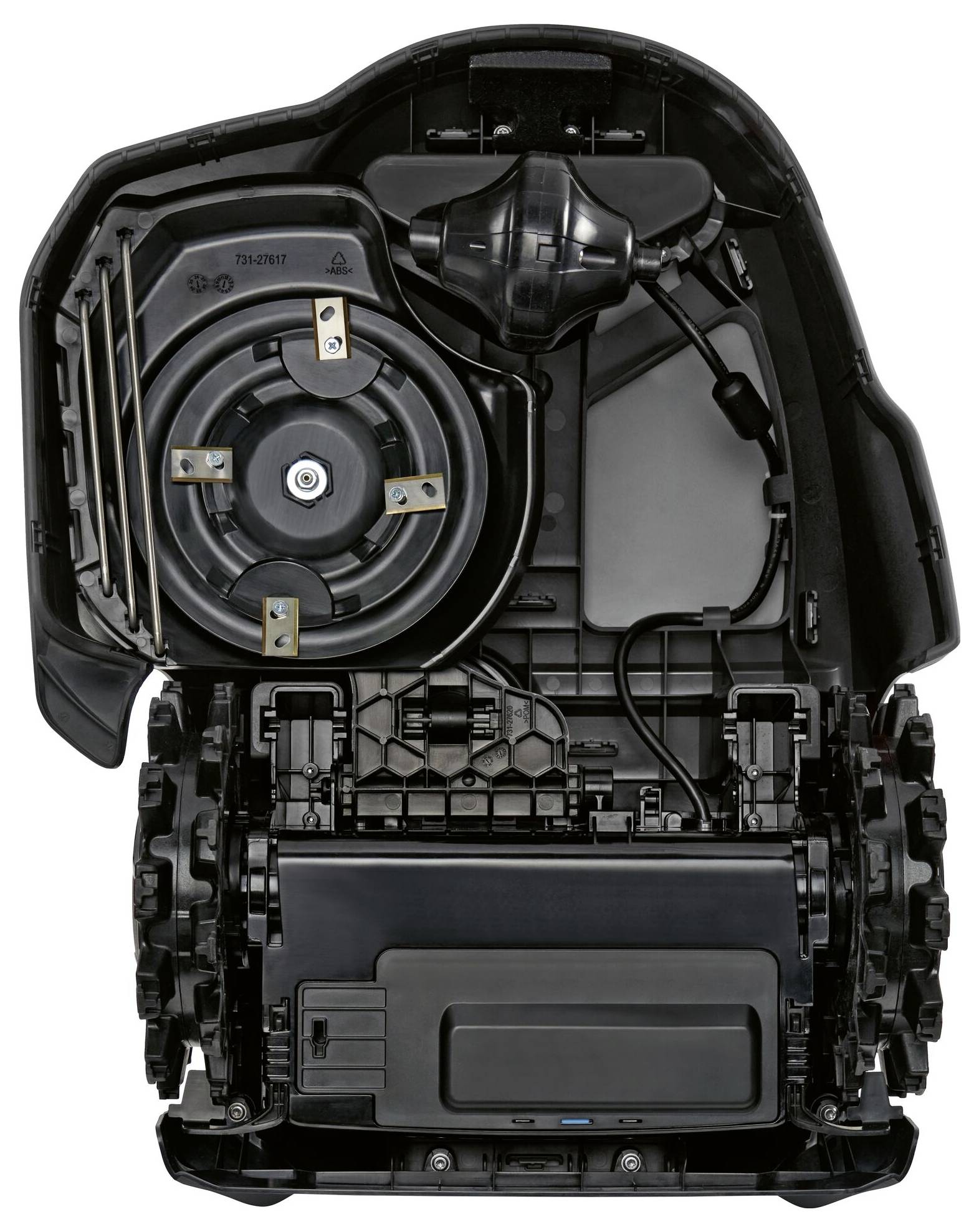 'Internal view of an automatic lawnmower showing visible electronics and mechanics, including motor and wheels.'