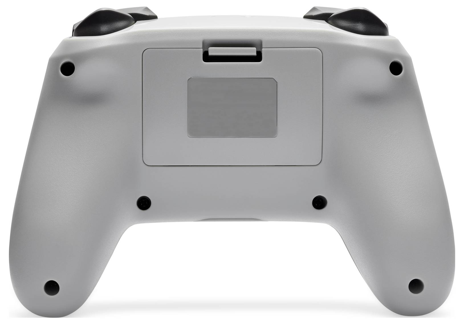 Rear view of a white gaming controller with a visible battery compartment and black buttons at both corners.