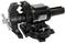A black vice with rotating and clamping mechanism, mounted on a workbench, suitable for securely holding workpieces.
