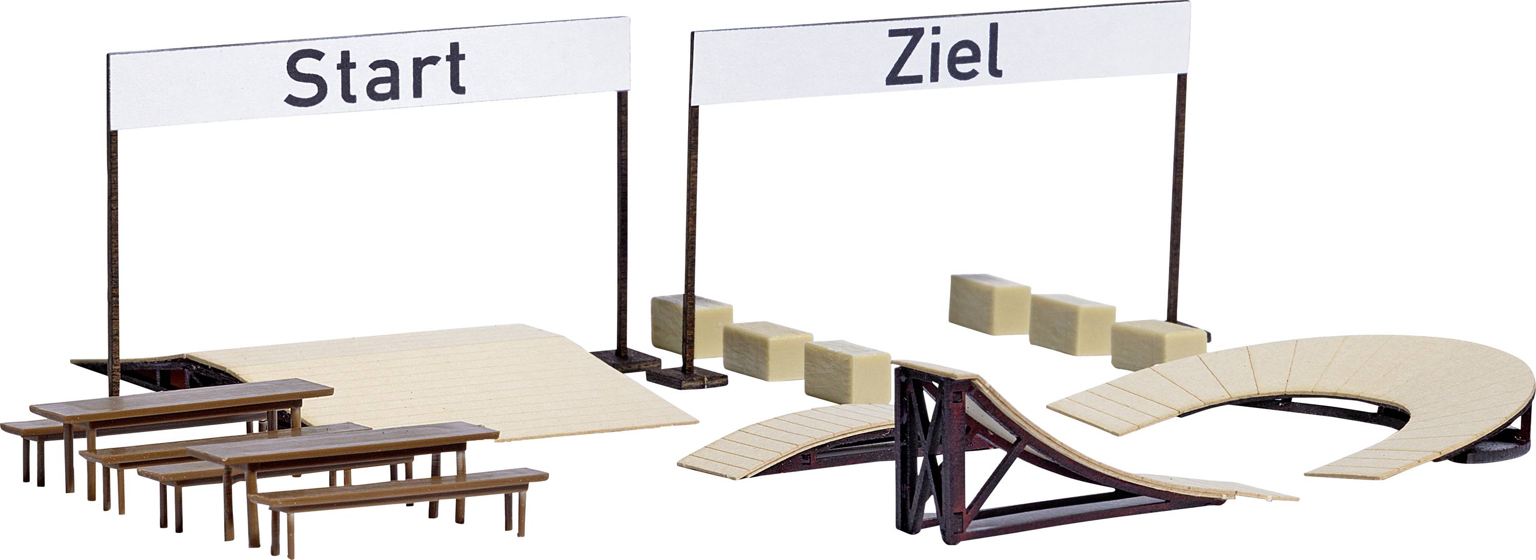 Start and end area of a miniature skate ramp park with ramps, curves and seating areas, illustrated using model-building accessories.