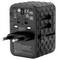 Black travel adapter with European plug, multiple plug options on the side and several certification markings.