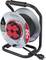 'Metal cable reel with a 20m cord, featuring four red sockets and a black handle, branded as Sygonix. Rated IP44 for outdoor use.'