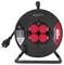 A black extension cord reel with four red outlets, a carry handle, and a 40-meter cable marker. It's designed for indoor and outdoor use.