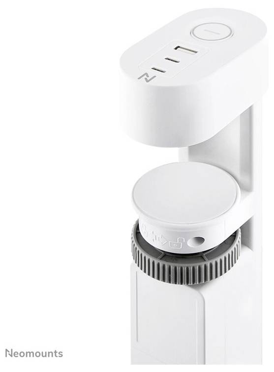 'Neomounts' monitor mount with USB ports on top, height adjustment rotary knob underneath, white design.