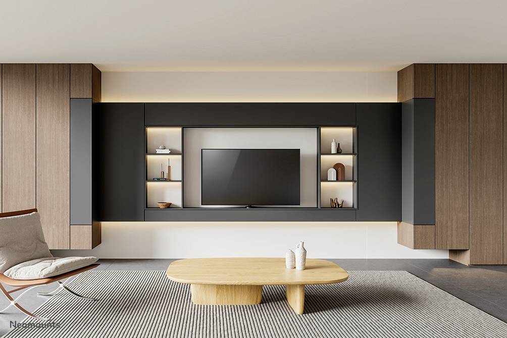 Modern living room with wooden details and a television in the centre. Open shelves with decorations. Contemporary design.