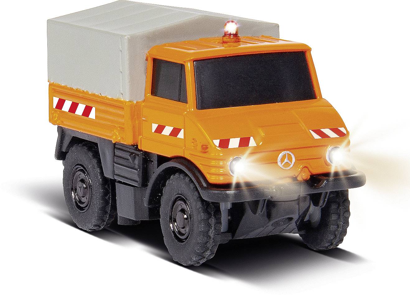 Toy lorry, orange, with white stripes and a canvas cover on the load bed, showing headlight detail.