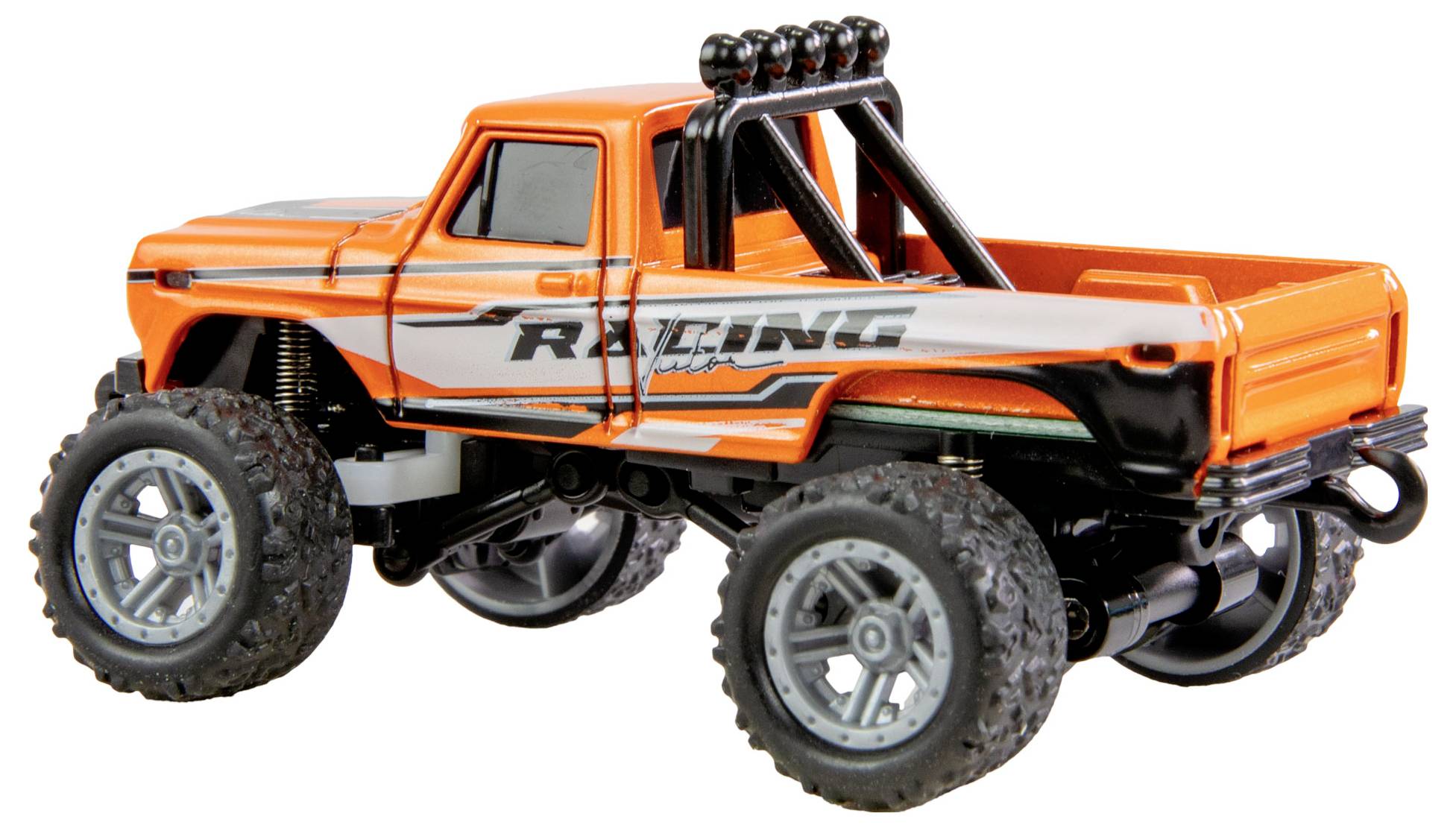 Toy monster truck in orange with large tyres and 'Racing' written on the side, standing on a flat surface.