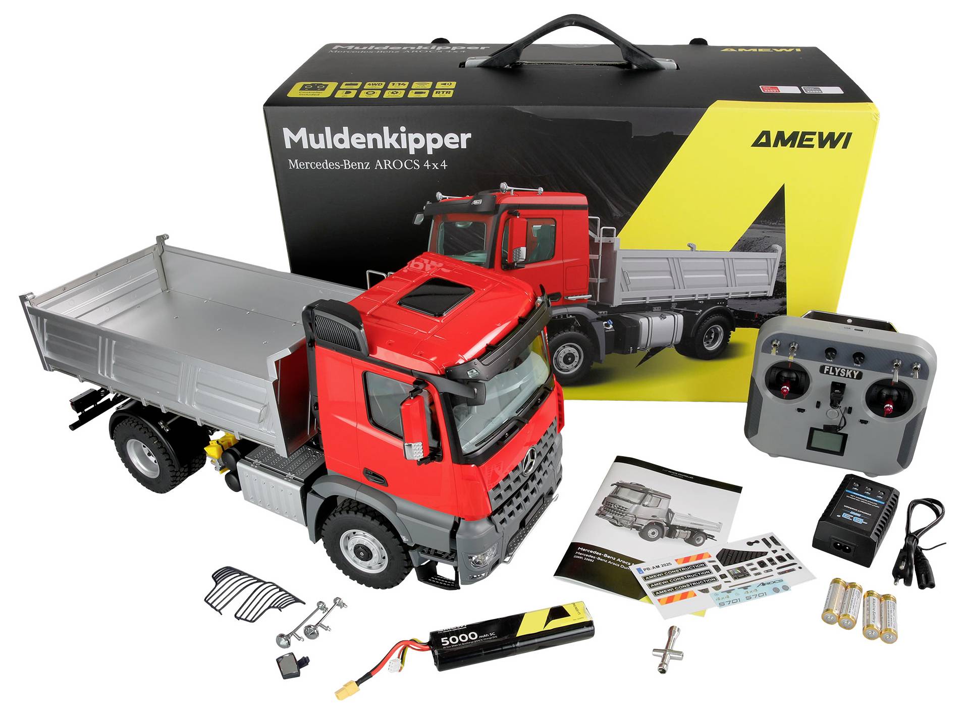 Red remote-controlled dump truck lorry next to packaging and accessories, including remote control, batteries, and instruction manual.