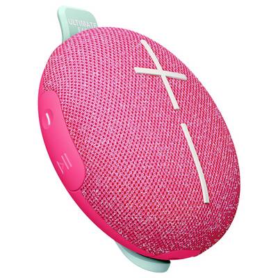 A portable, pink speaker with large plus and minus buttons for volume control. Side view with a slight tilting angle.