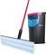 A blue mop with a red handle and a black bucket with a water container are standing side by side.