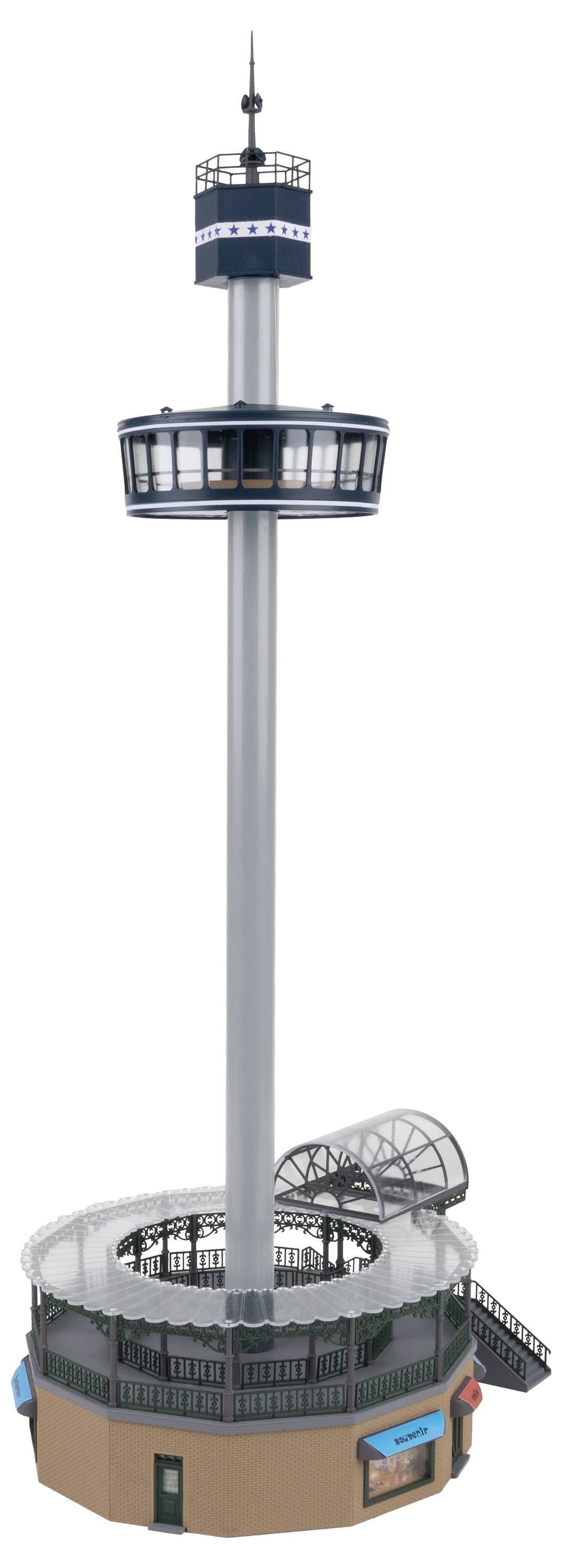 Observation tower with a circular, glass viewing platform on a tall mast, surrounded by a lower entrance area.