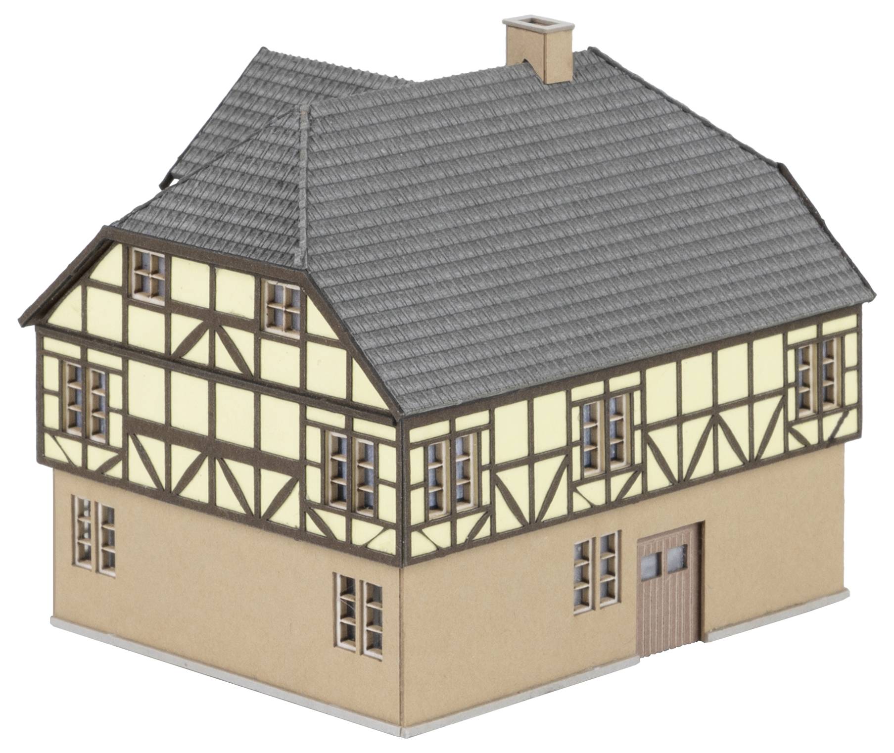 A model of a two-storey half-timbered house with a grey roof and multiple windows.