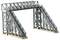 A model of a steel railway bridge with two staircases leading to a platform. The structure shows detailed lattice girders.
