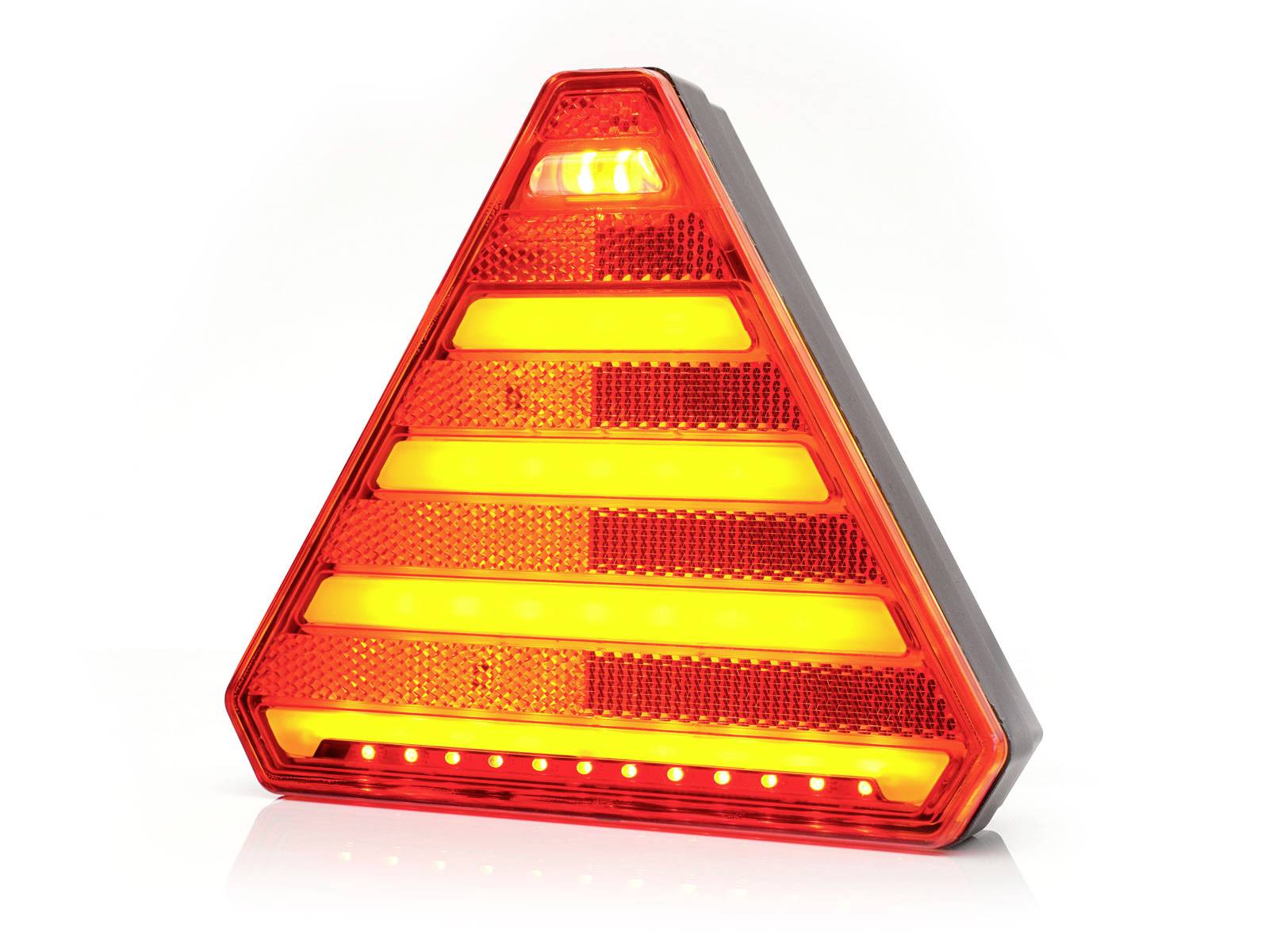 Red warning triangle with yellow light, standing on a flat surface. It signals danger or a breakdown.<br><br>Translation to British English:<br>Red warning triangle with yellow light, standing on a level surface. It indicates danger or a vehicle breakdown.