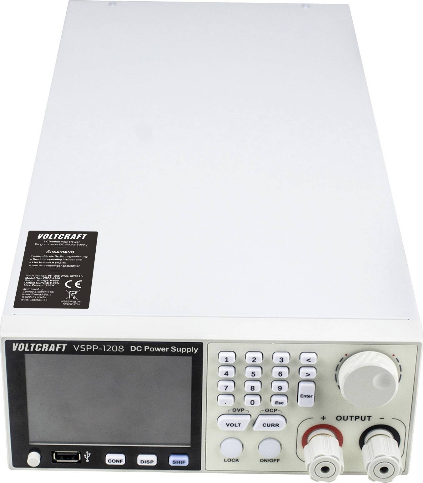 A DC power supply unit with a digital display, keypad, and output terminals. The brand name 'Voltcraft' is visible on the front.