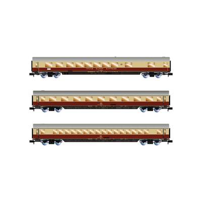 Three Trans-Europ-Express train carriages in beige and red livery, lined up side by side, showcase classic designs.