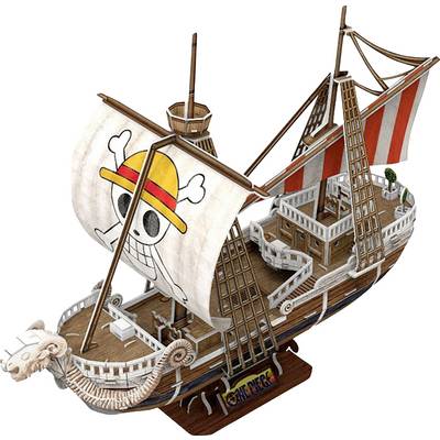 A model of a historical sailing ship with a large white sail. A smiling skull logo is depicted on the sail.