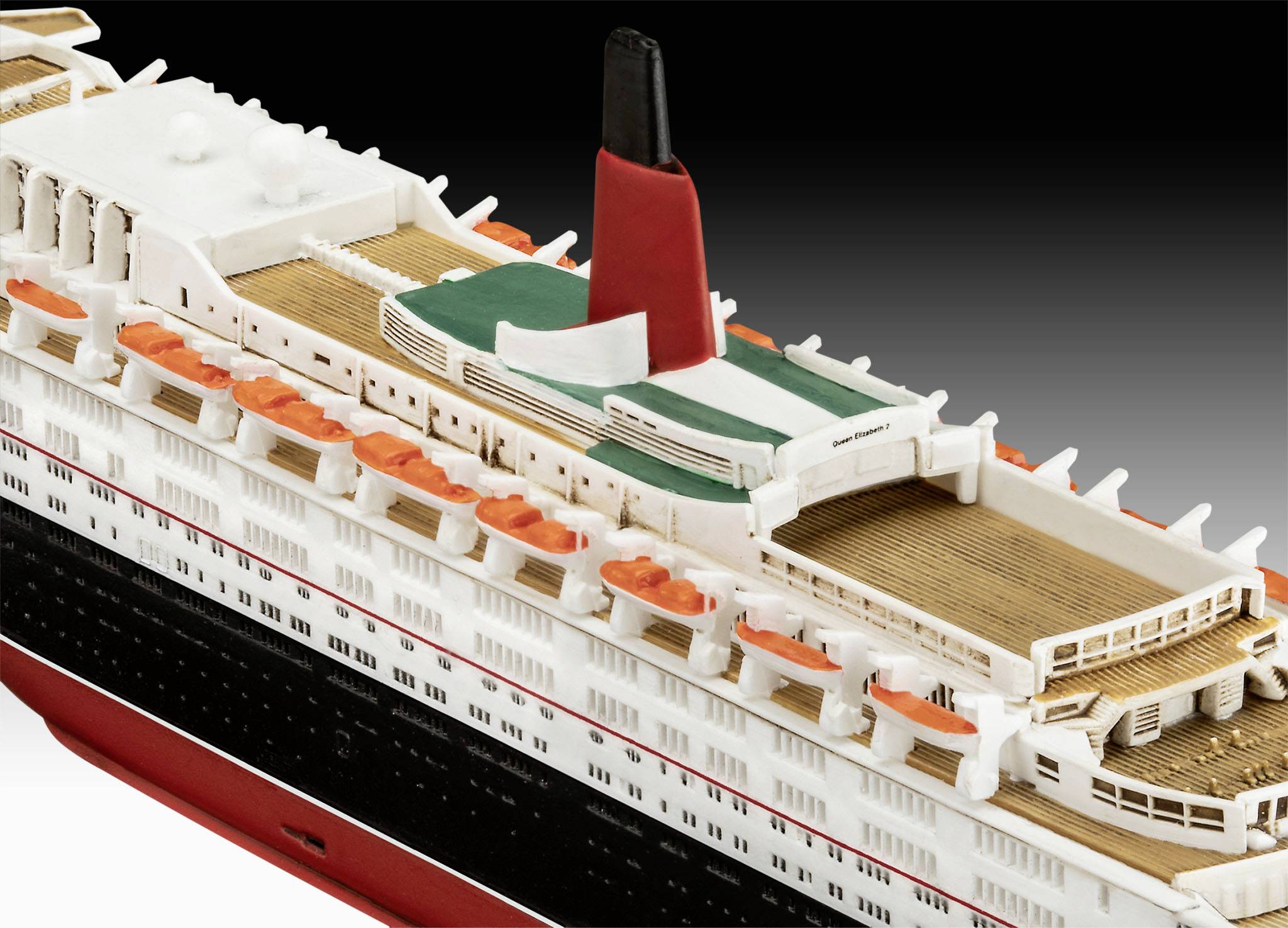 Model of a cruise ship with a red funnel and orange lifeboats on the side. Decks are clearly visible.