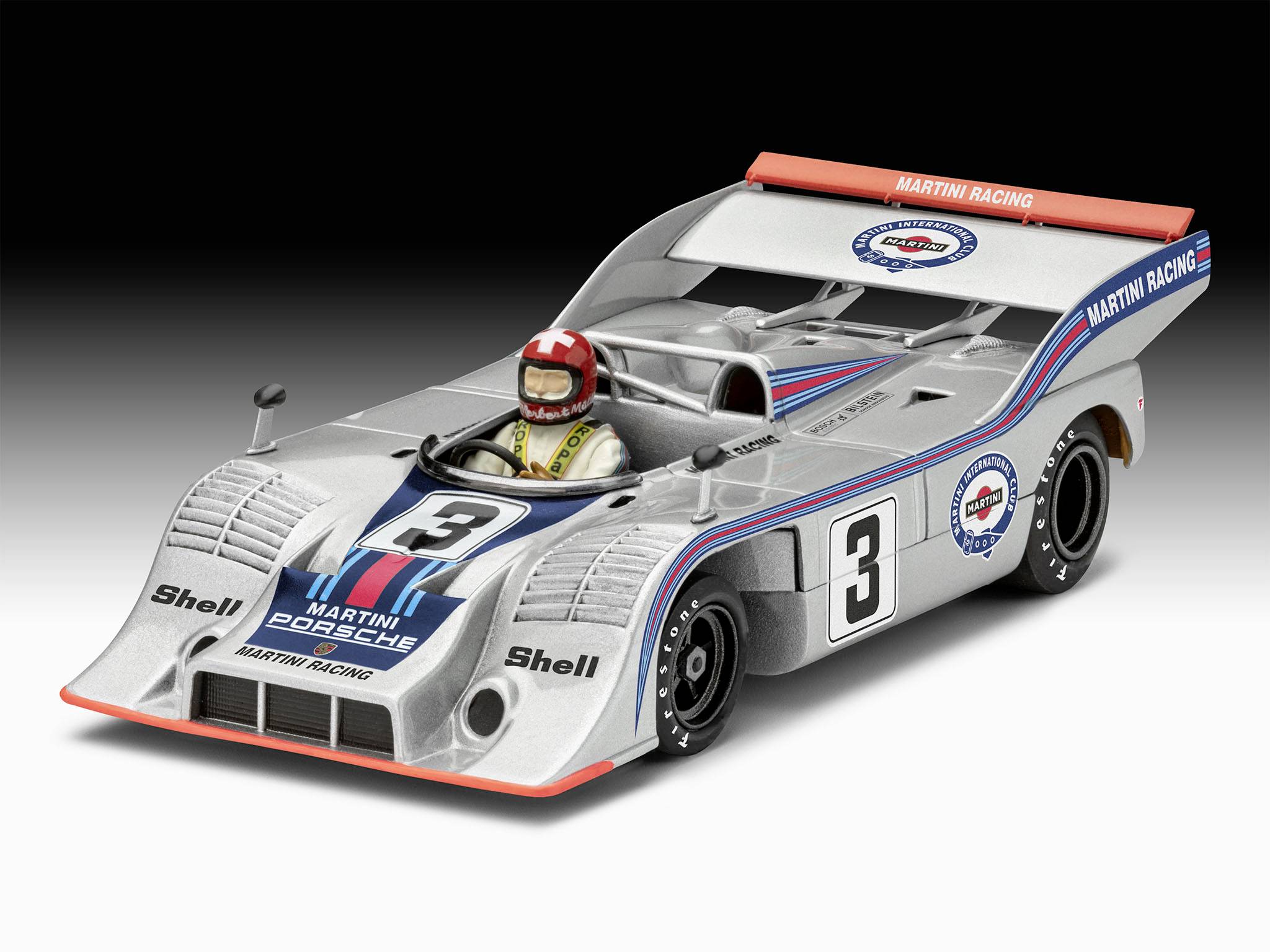 A silver racing car with race number 3 and Martini Racing livery, driver in the cockpit, against a black background.