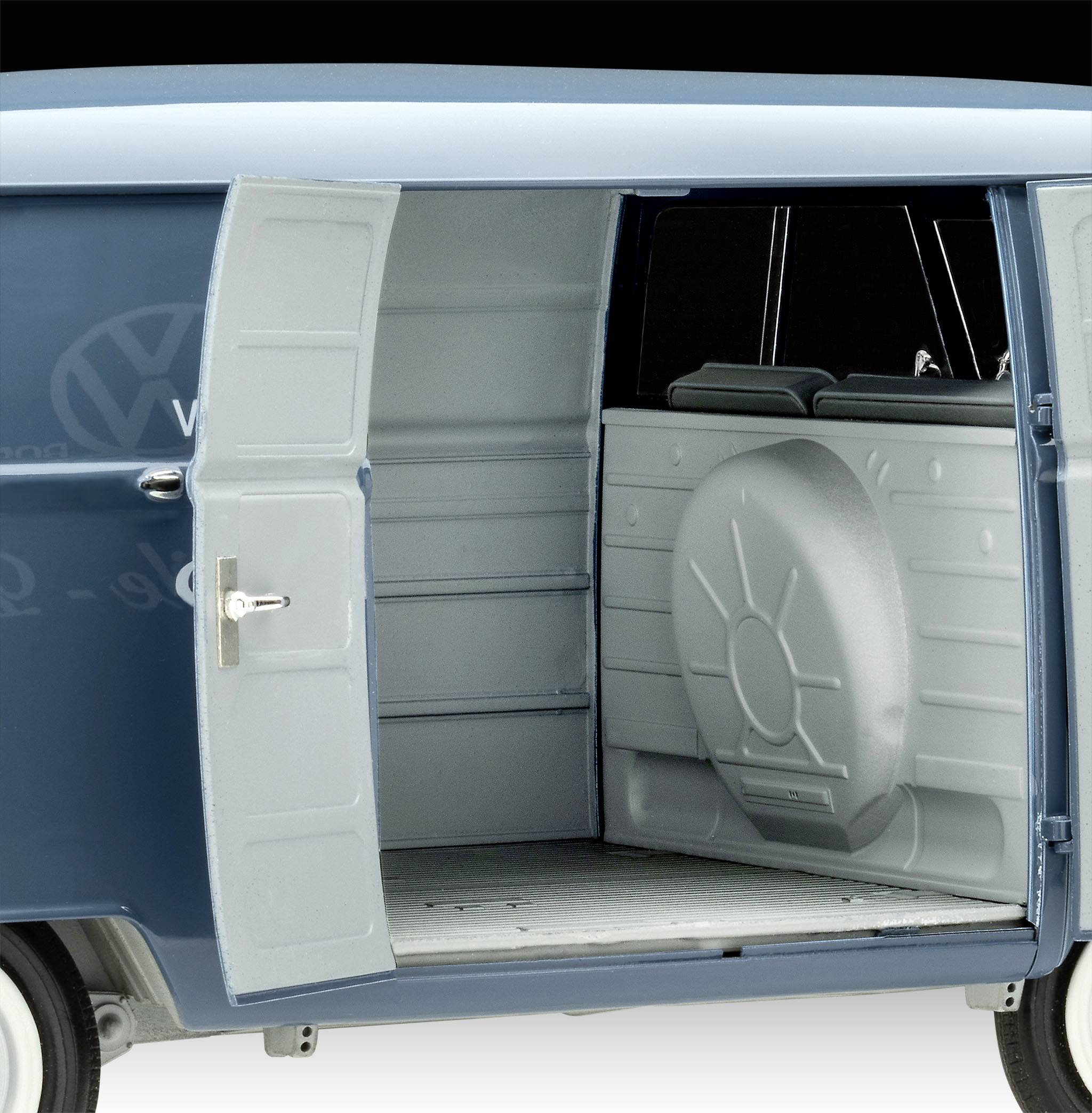 Opened blue delivery van with empty interior and visible spare wheel. Front part of the double door open, black seats in the front.