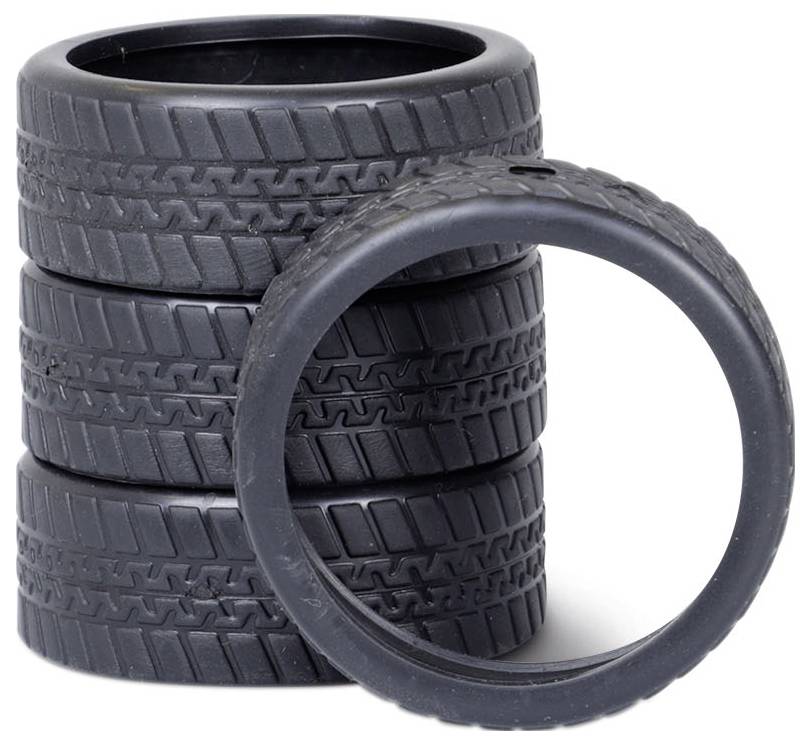 Five black model tyres, four stacked and one standing in front, show detailed tread.