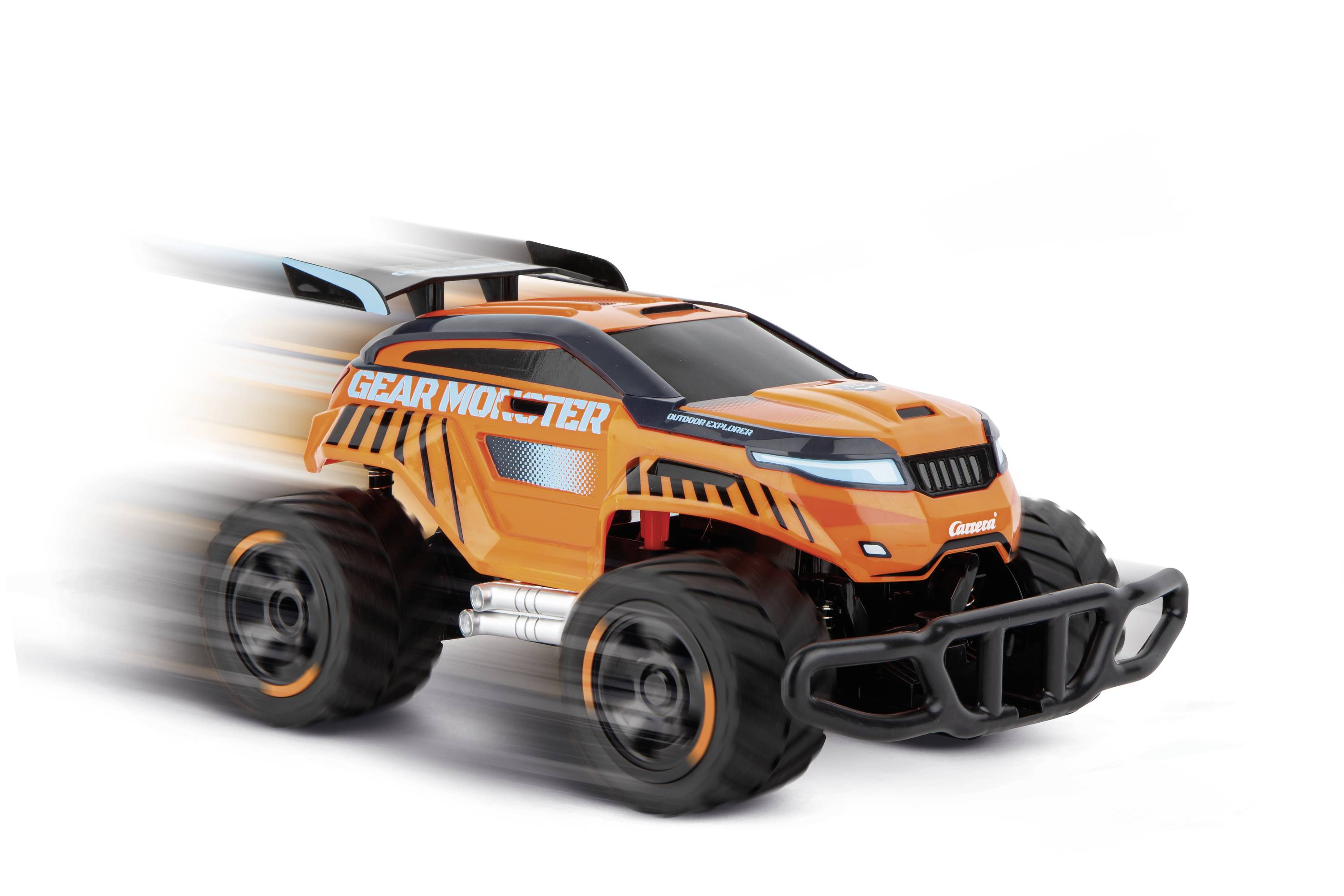 An orange and black toy car with the inscription 'GEAR MONSTER' is moving quickly, evident from the motion blur on its wheels.