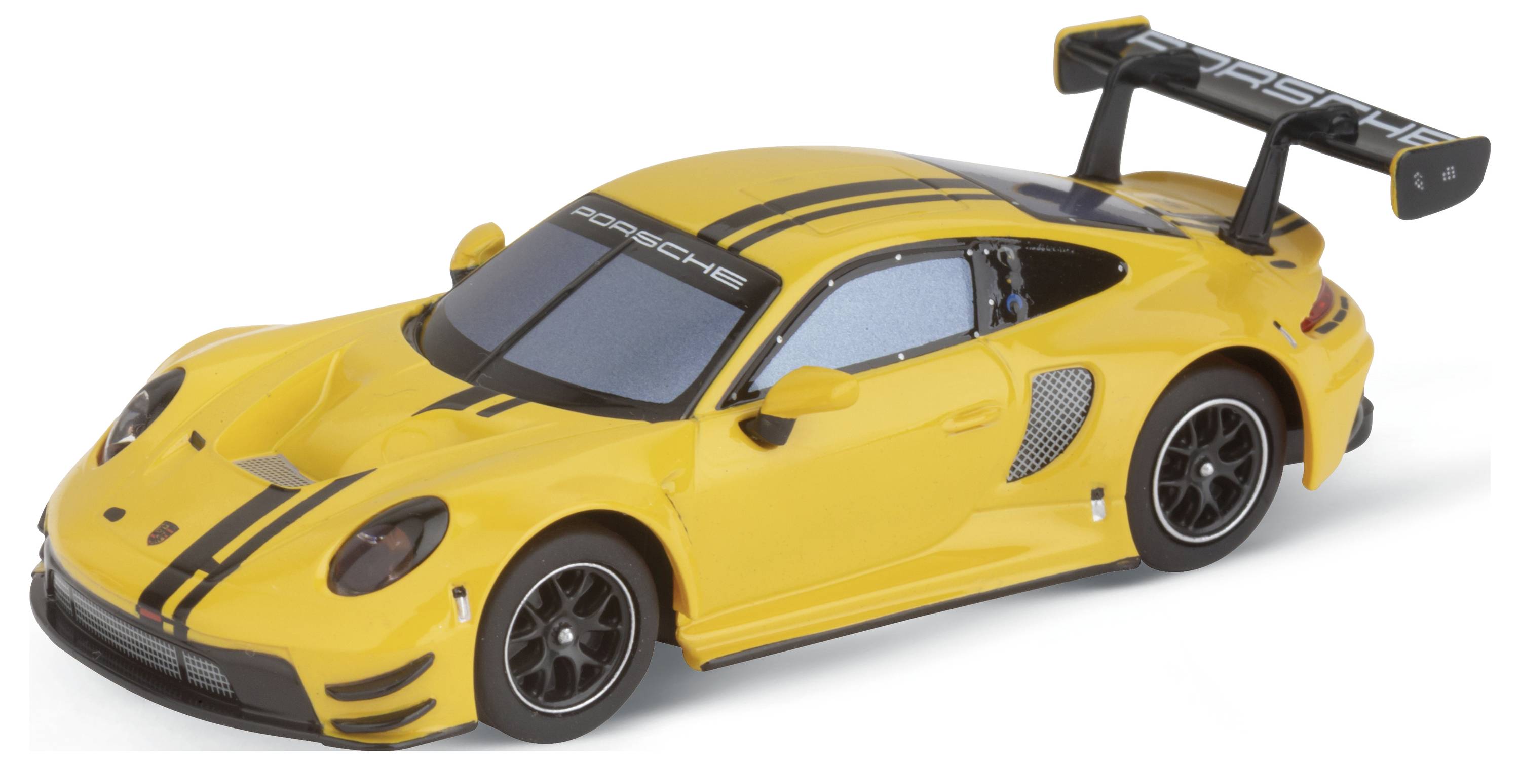 Yellow model car of a sports car with a black stripe pattern and large rear spoiler, photographed from the side.