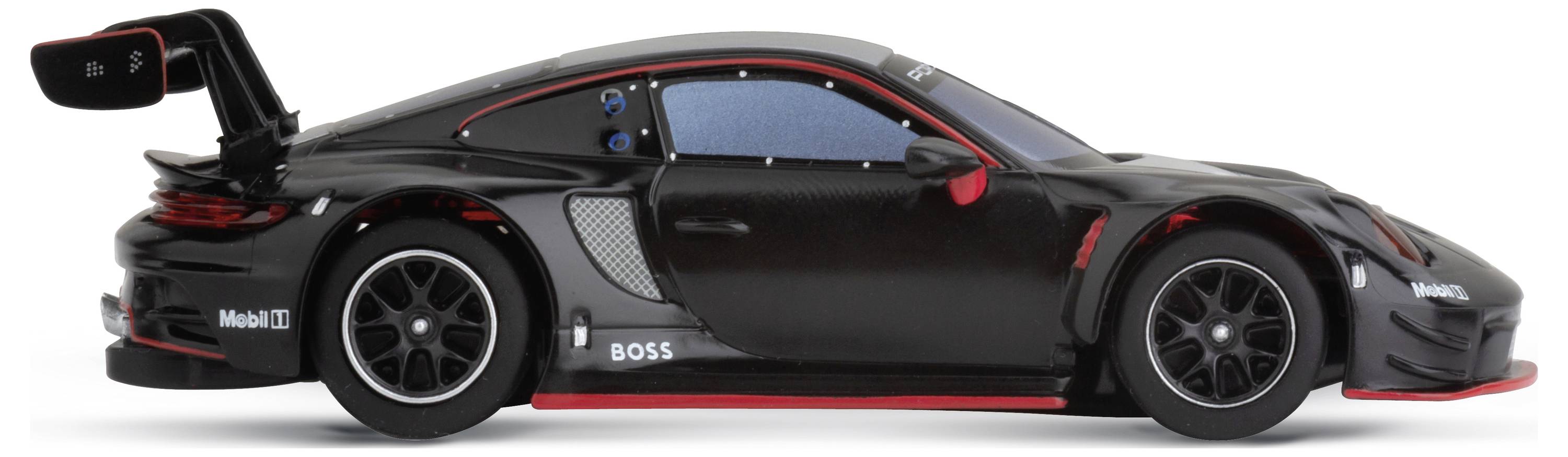 A black model racing car with red accents and a large rear spoiler, pictured from the side.