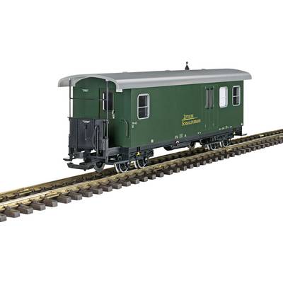 A green railway carriage of the Zittau Narrow Gauge Railway stands on railway tracks. The carriage has side windows and a door.