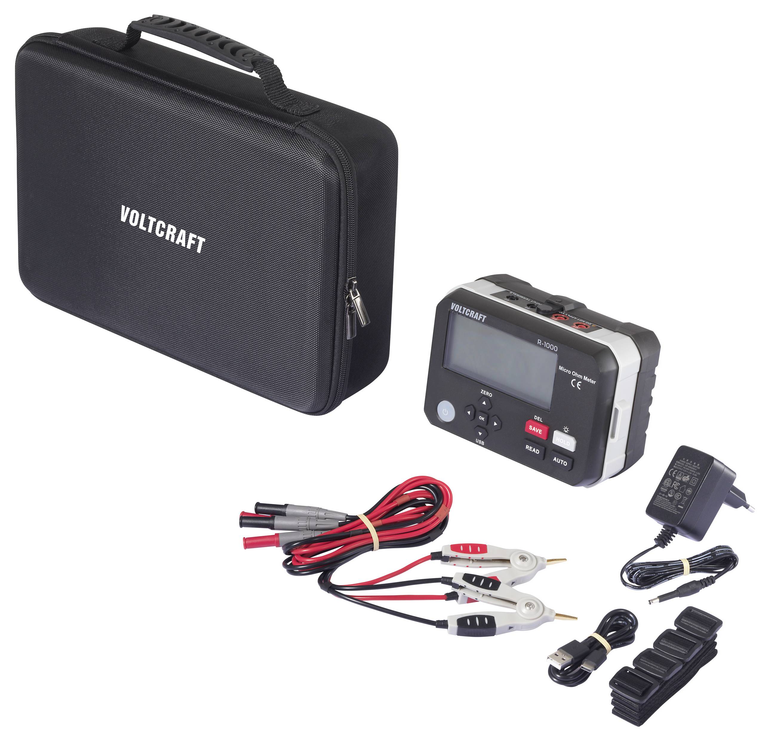 A Voltcraft battery tester kit includes a carrying case, tester device with display, alligator clips, charger, and various connectors.