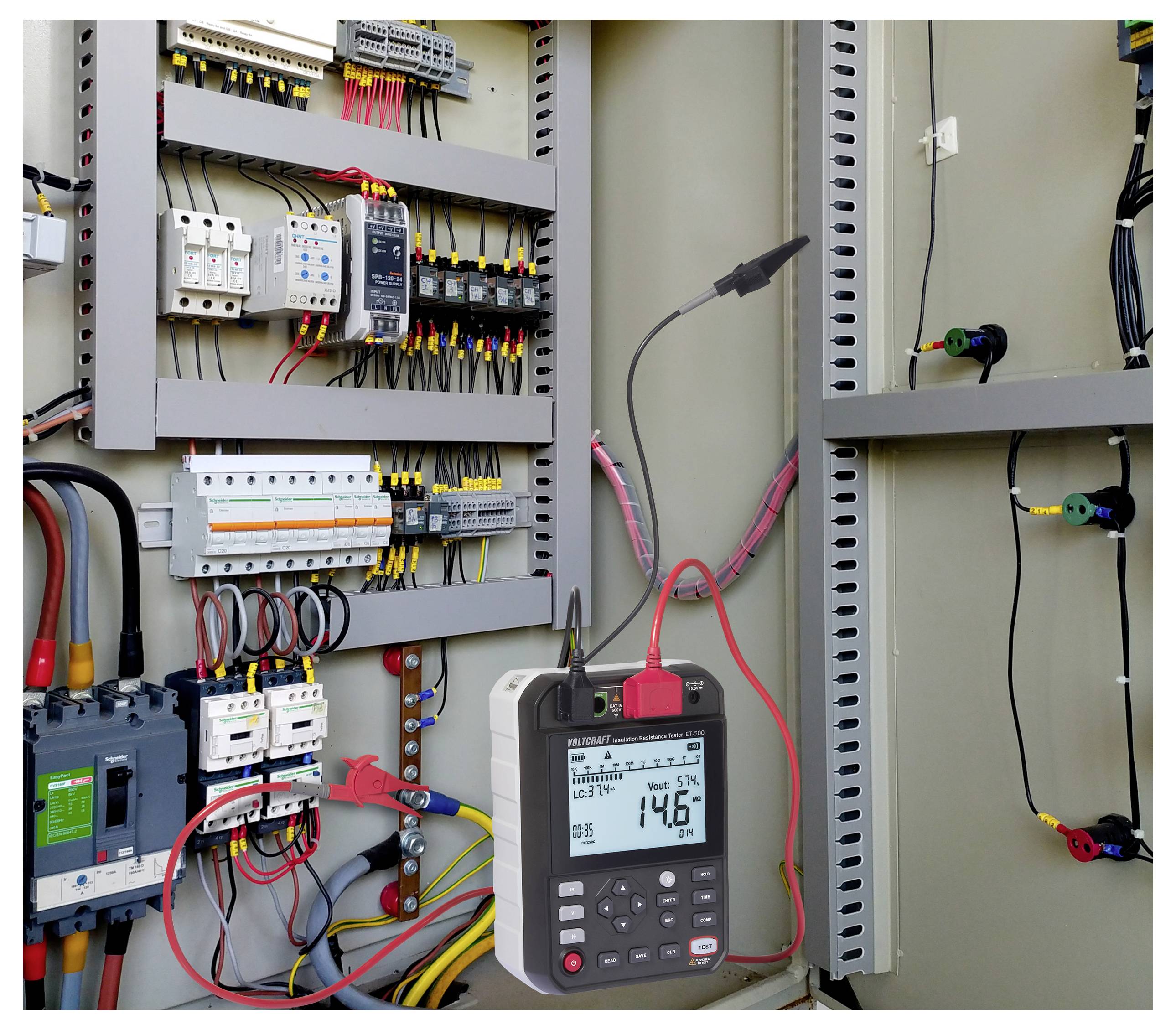 'Multimeter displaying 146 volts, connected to a panel with wires and electrical components, indicating an electrical measurement in progress.'