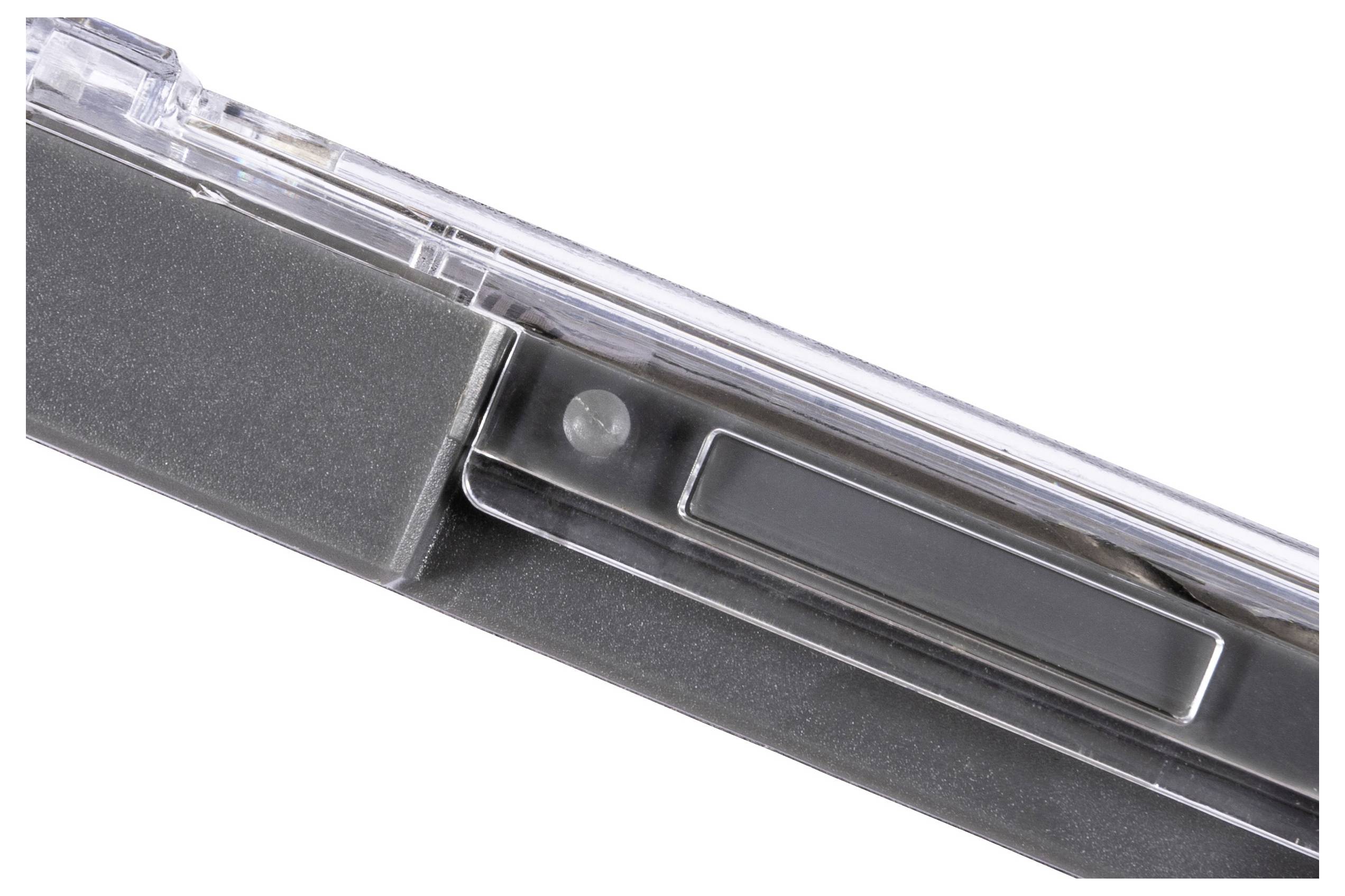Close-up of a sleek, clear and black pen clip with a minimalist design, showing the mechanism and attachment point on a transparent pen.