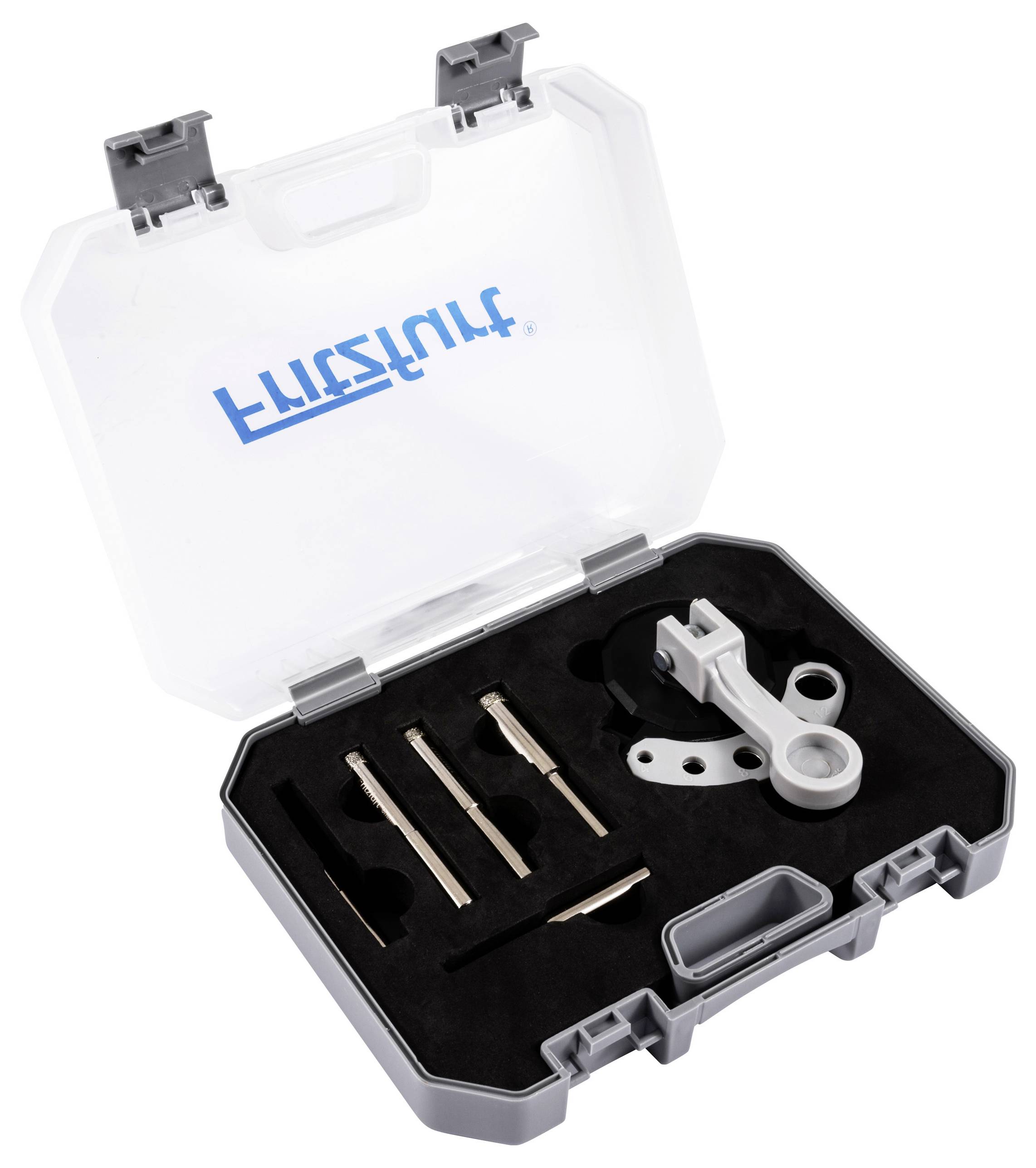 A toolbox containing various precision tools in a foam insert, used for technical or mechanical work, with a transparent lid.