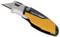 A yellow and black folding knife with 'Fiskars PRO' printed on the handle.