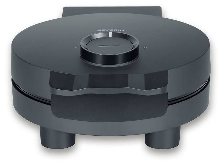 Black waffle maker with temperature control on the top surface, standing on a flat surface.
