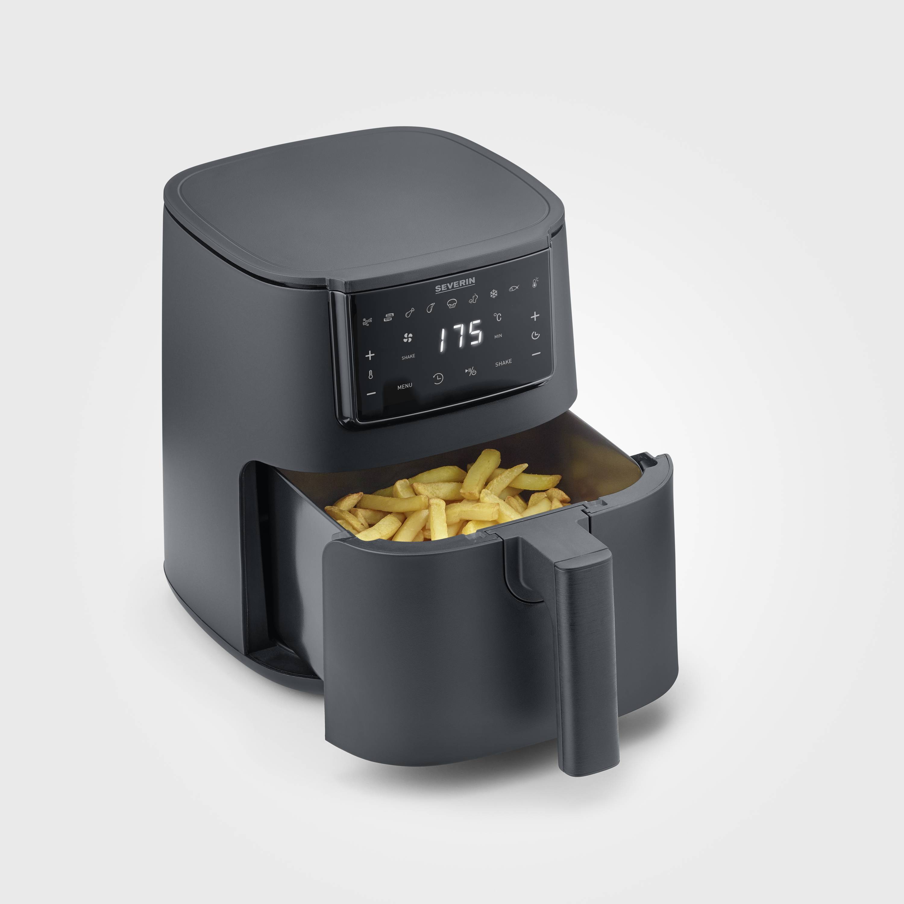 A black air fryer with an open basket full of chips stands against a grey background.