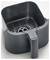 Deep fat fryer basket made of black plastic, empty, with removable interior holder.