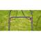 A verdant lawn with focus on part of a metal frame fitted with cable clips. The scene conveys a sense of gardening.