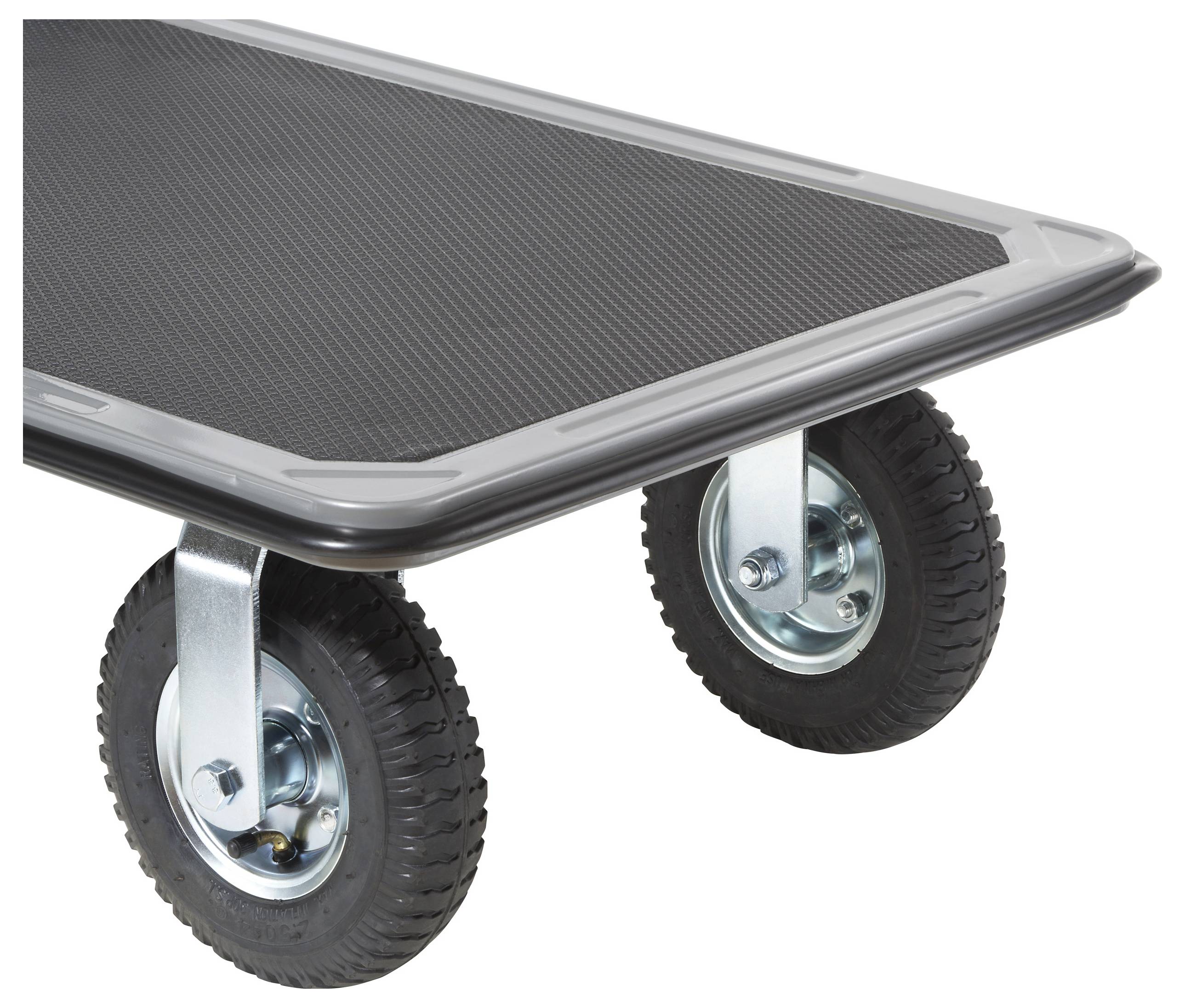 A close-up of a flat trolley platform with rubber wheels, designed for transporting heavy items. The surface is textured for grip.