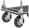 A close-up image of a platform trolley's large rubber wheels, each with a sturdy metal bracket and locking mechanism for stability.