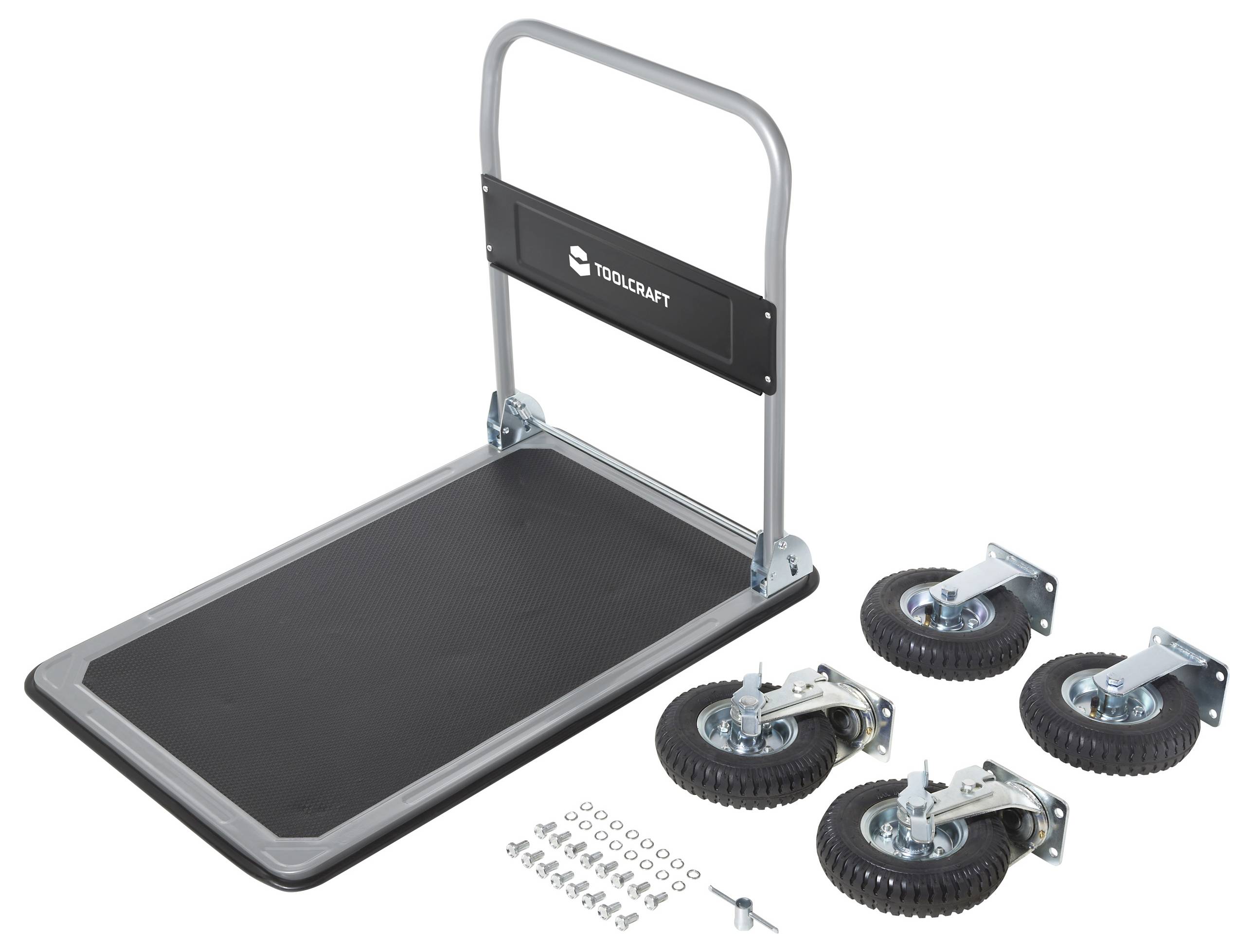 A flatbed cart with a handle and black platform is shown. Four wheels and screws are placed beside it, indicating assembly parts.