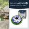 'Solar Active WaterLily Purple' decoration in a garden pond beside stones and green vegetation. Product packaging visible.