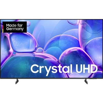 A television with the inscription 'Made for Germany' and 'Crystal UHD' displays a blue-violet abstract image on the screen.