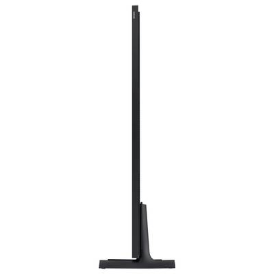 Side view of an ultra-thin flat-screen television resting on a narrow stand.