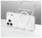 A clear smartphone case with a white circular pattern rests against a white smartphone with triple camera lenses on a reflective surface.
