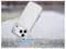 A phone case with a circular design falls onto a concrete surface, highlighting its durability and protection features.